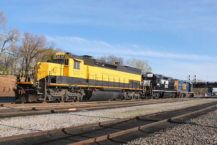 NYS&W southern division assigned power rests on a sunny afternoon in front of the yard office